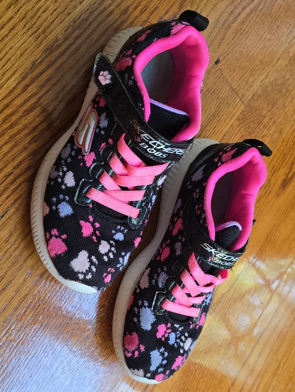 Skechers Kids Black Sneakers with Pink and Purple Paw Prints